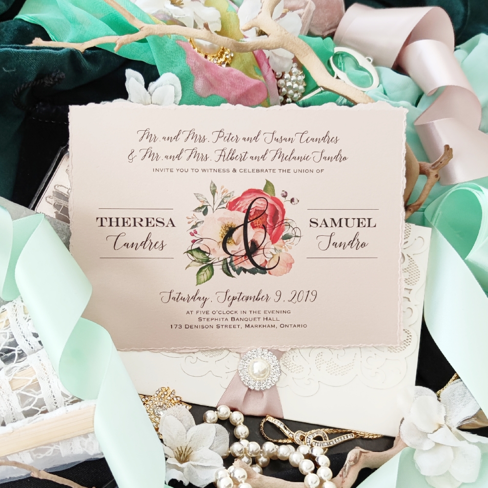 Deckled edge invite on blush pearl paper  with blush and pink flowers printed.