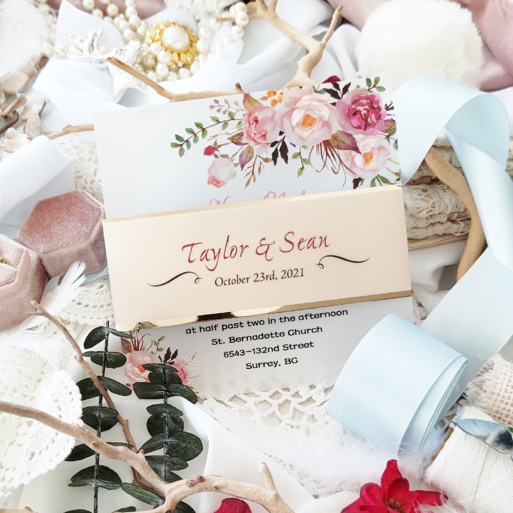 Square wedding invite with UV print and vellum printed belly band with gold chrome layer.