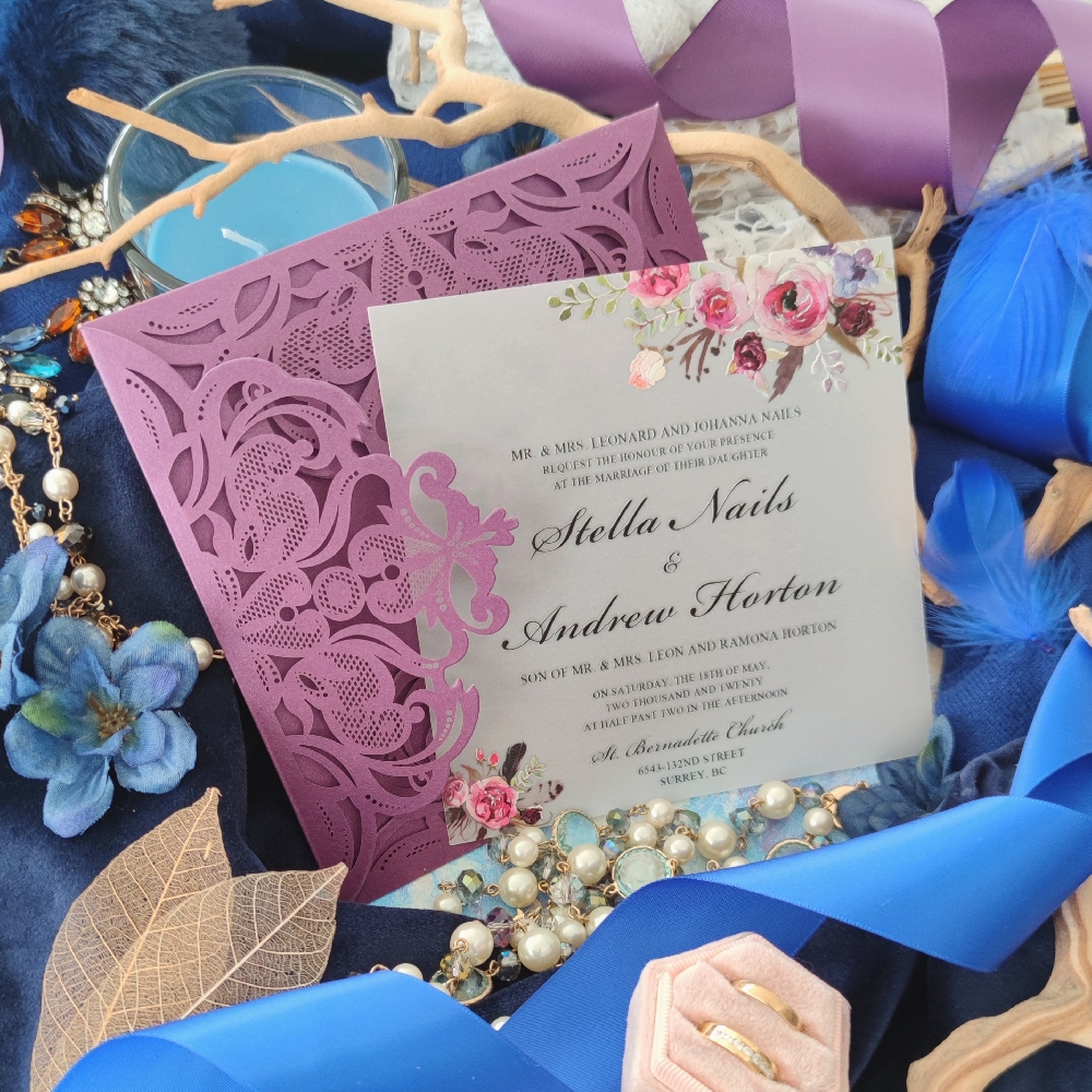 Vellum invitation card with UV printing inside a purple shimmer lasercut pocket.