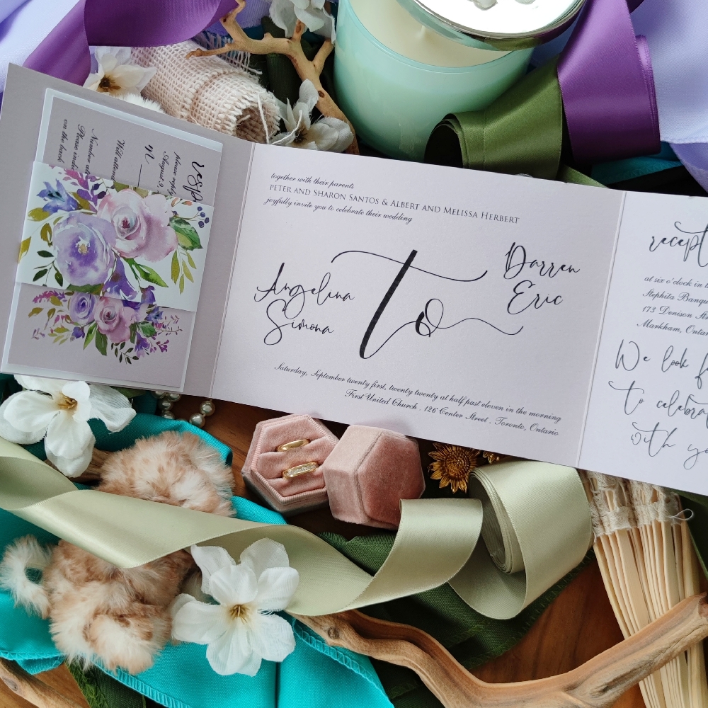 Orchid pearl pocketfolder invite with special paper band to hold the response cards.