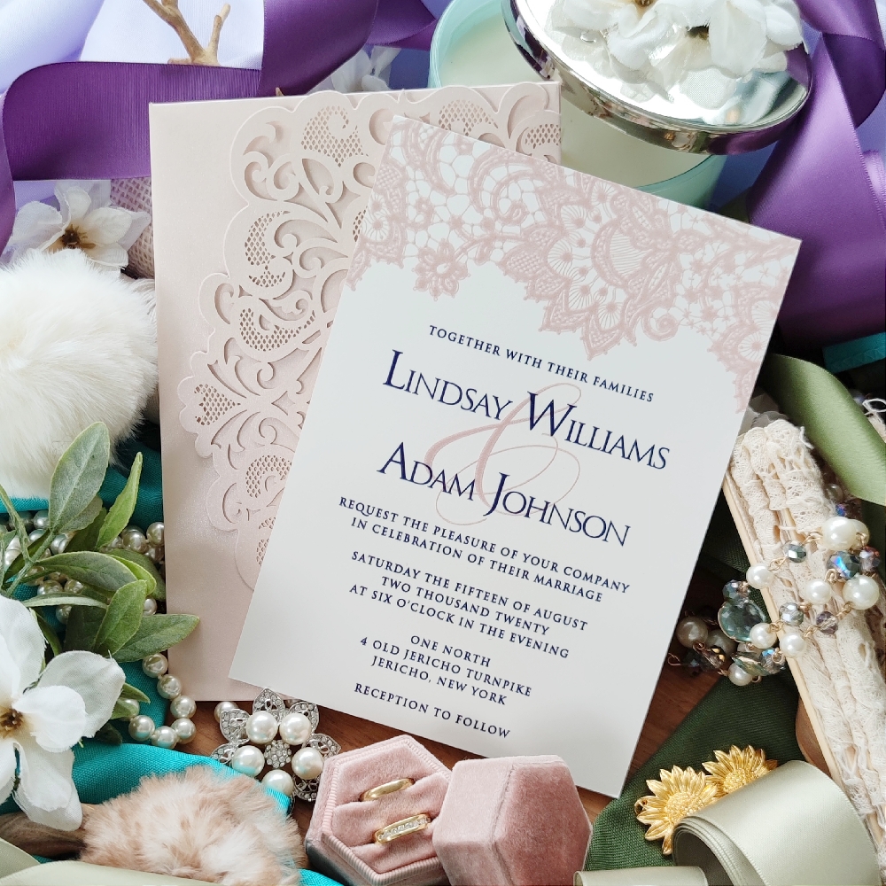 Single card invite along with a blush shimmer laser cut invitation