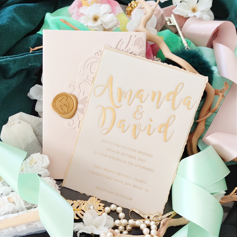 UV Printed vellum insert with a lasercut folder and wax seal