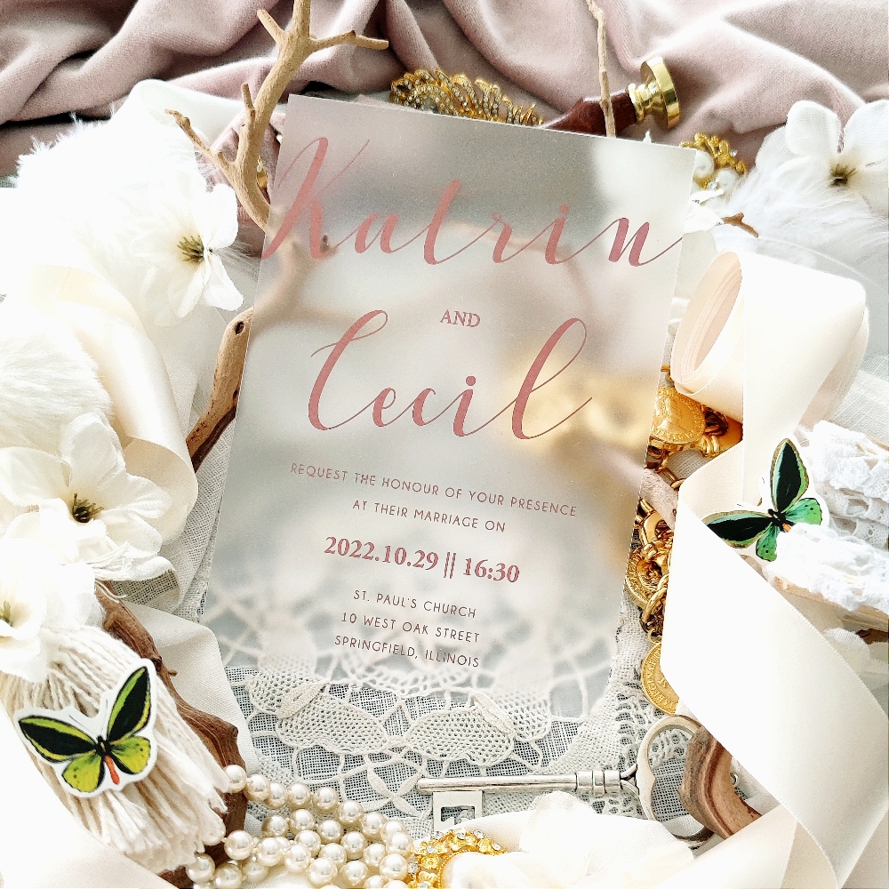 This is a frosted acrylic wedding invite using a blush UV ink.