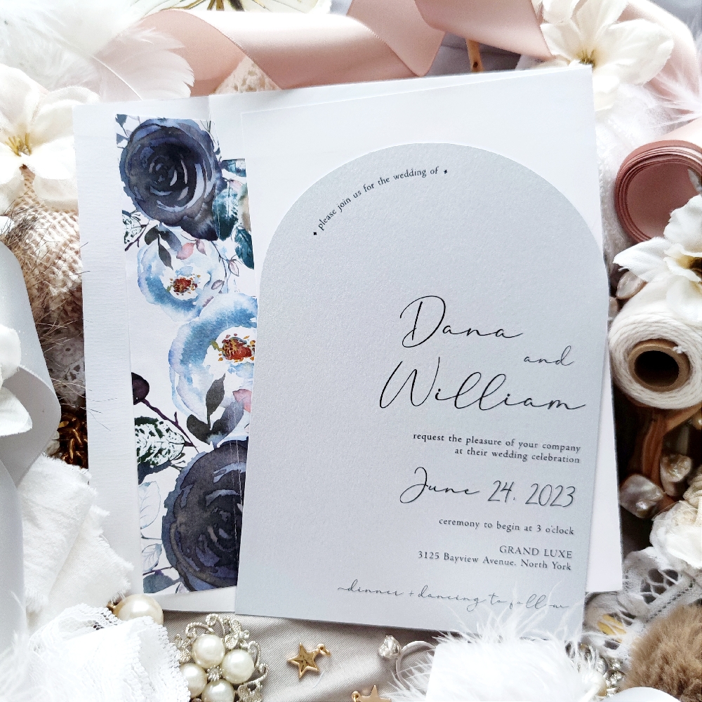 Dana & William created a modern arch shaped wedding invitation.  The wedding cards are printed on an Ice Pearl paper in black ink.