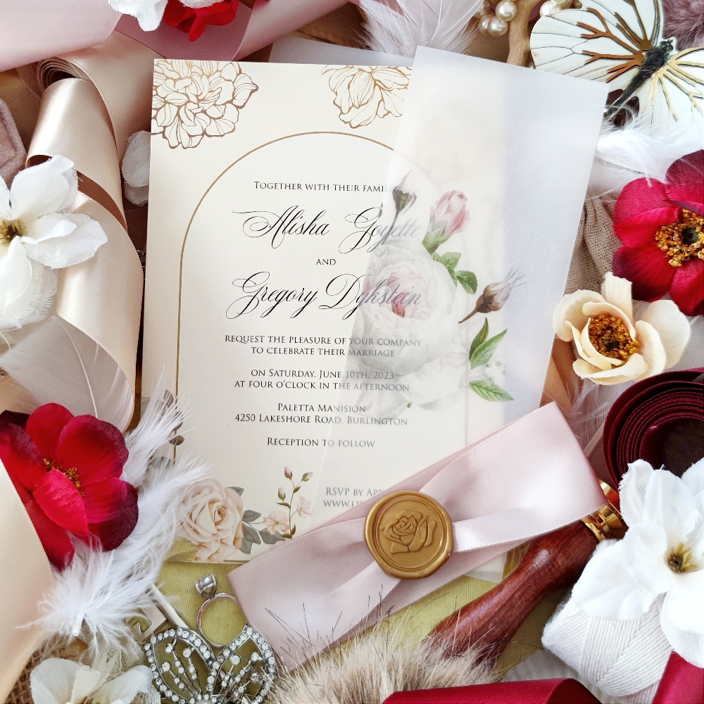 Alisha & Gregory went with a single card design with a vellum wrap and ribbon wax seal combo.  They have a nice printed arch design on the main layout with florals and backgrounds.