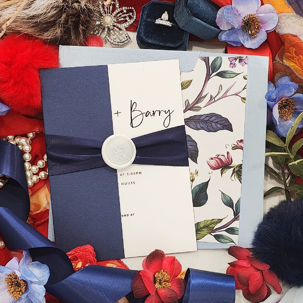 Half Gate Fold wedding card with navy ribbon and ivory wax seal