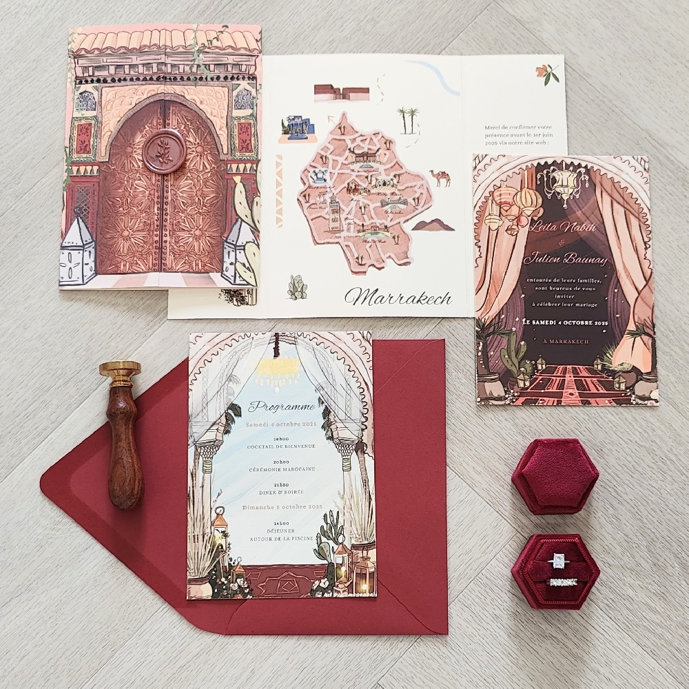 Gatefold style wedding invite with wax seal and multiple inserts for a destination wedding.  Red lacquer envelope.
