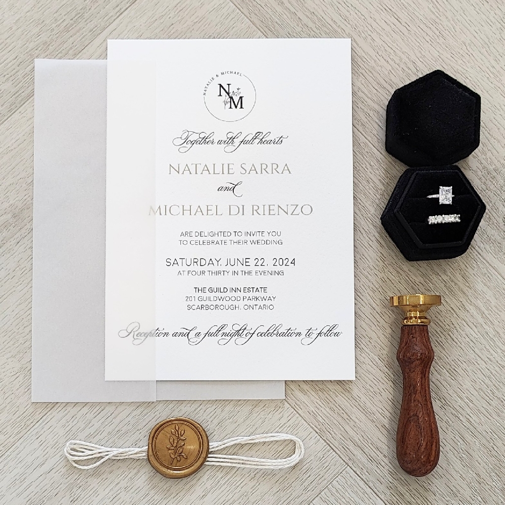 Single card wedding invitation with a full vellum enclosure, white string and gold branch wax seal embellishment