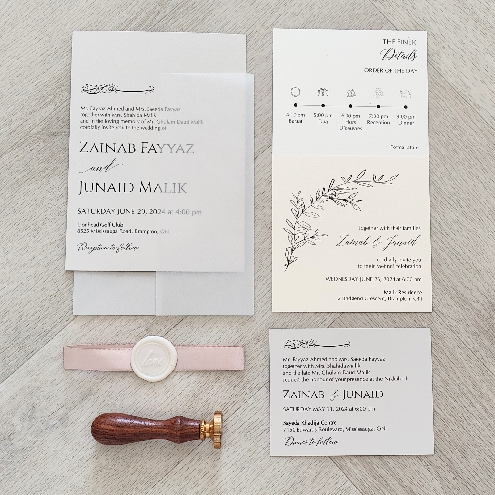 Single card wedding invite with full vellum wrap enclosure and ribbon & wax seal embellishment.  Multiple inserts.