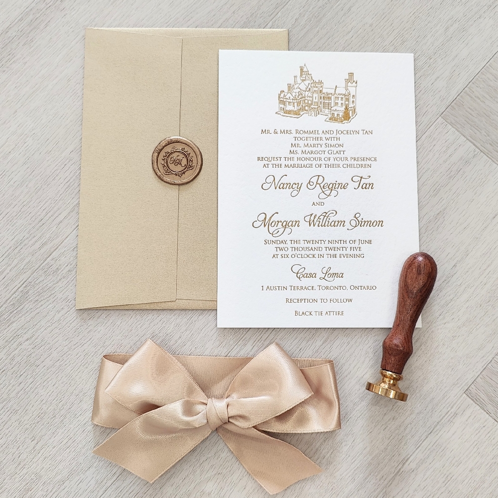 Letterpress Wedding Invitation with a Gold Satin Bow and Gold Envelope