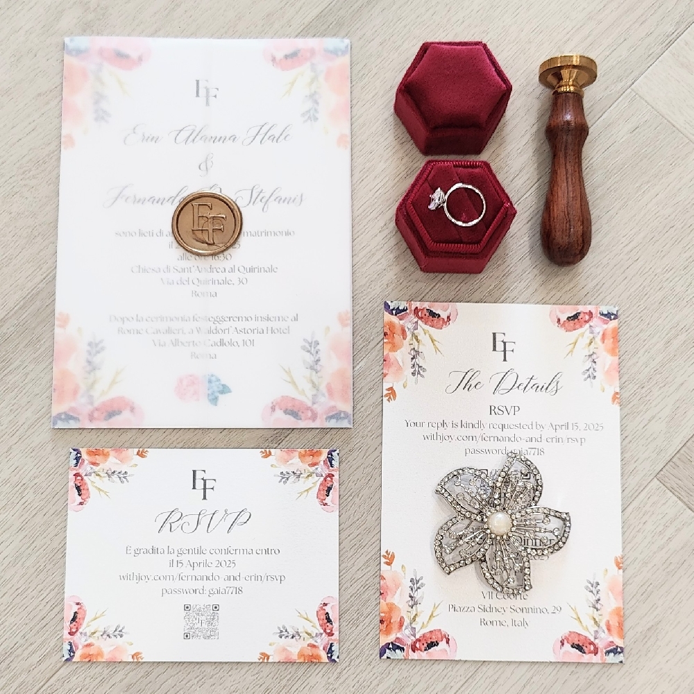Single card wedding invite with florals and full vellum wrap and gold wax seal.