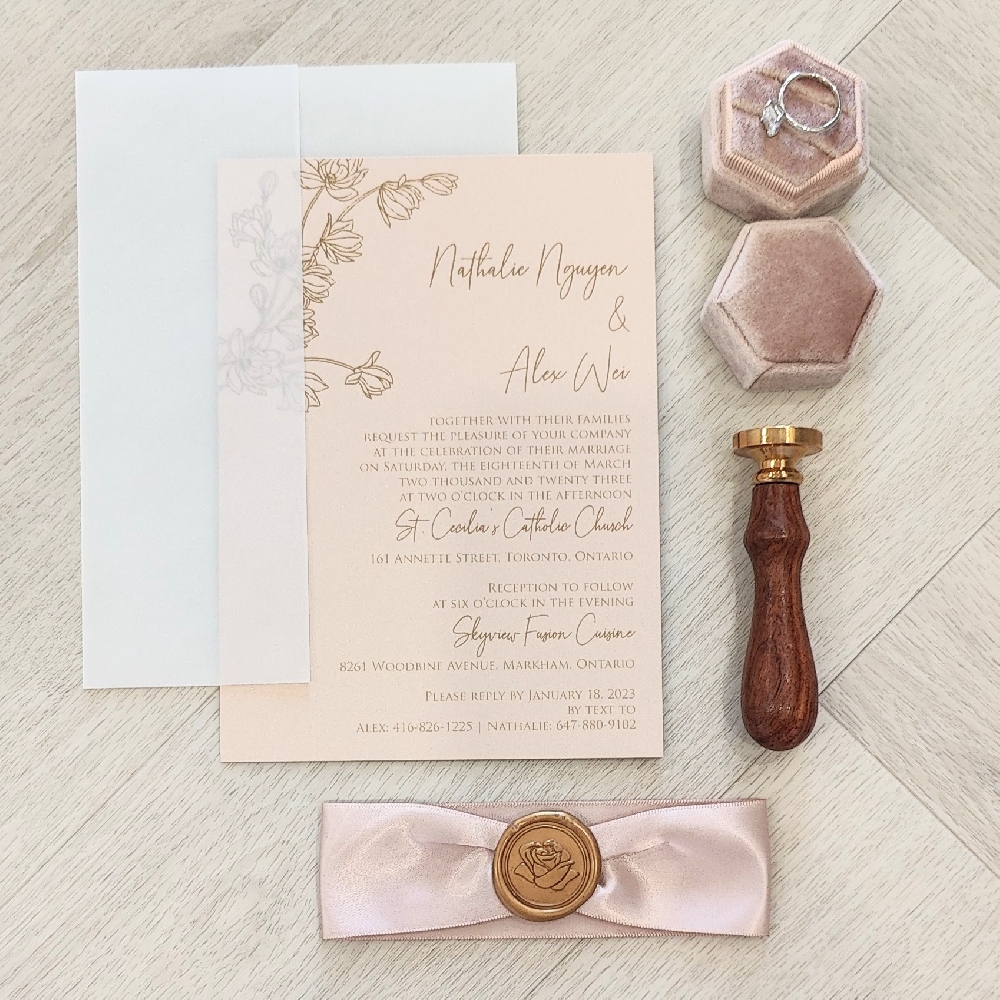 Single card invite with vellum wrap, ribbon and wax seal embellishment.