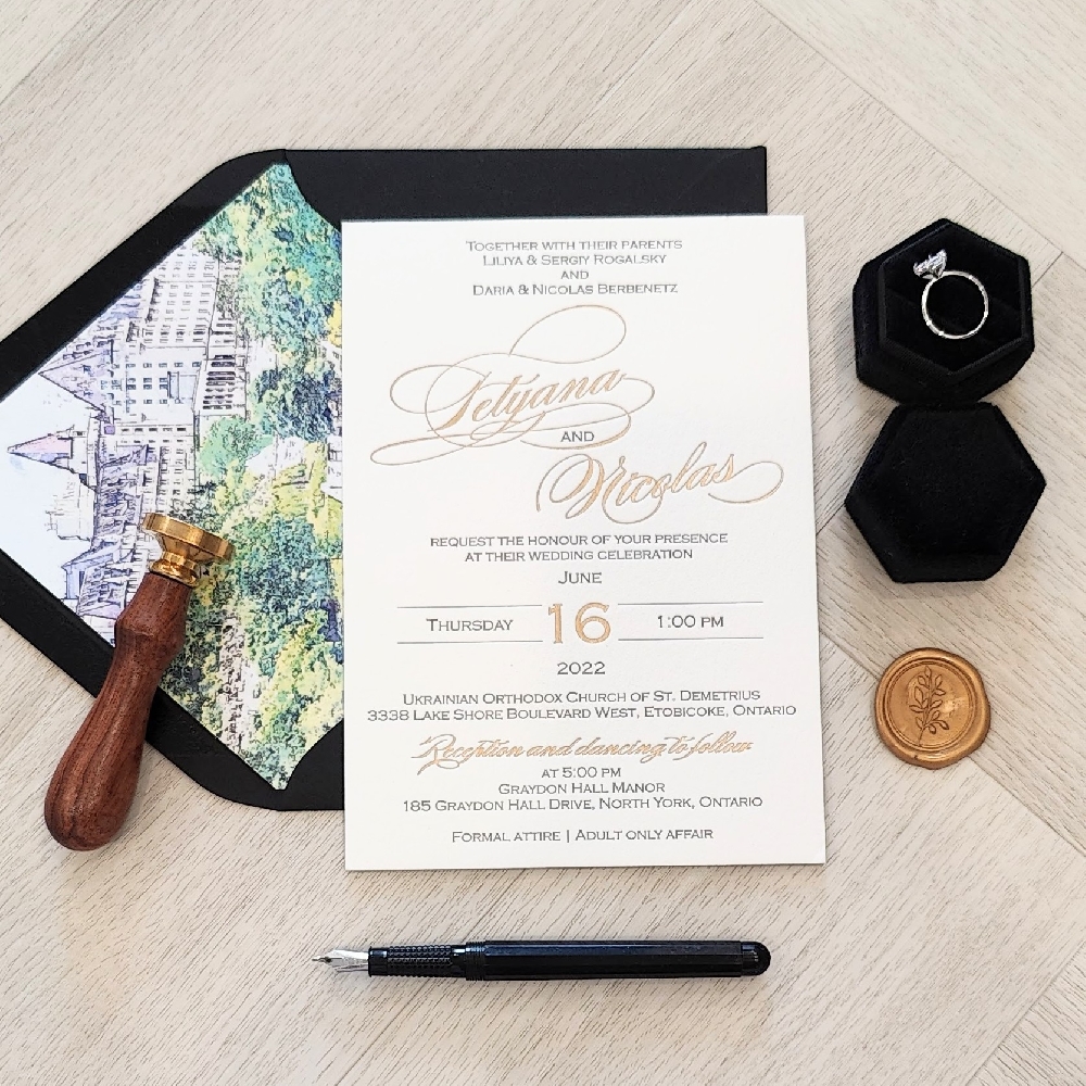 Letterpress wedding invite with gold foil pressed names.  Black envelope with venue sketch inspired liner.