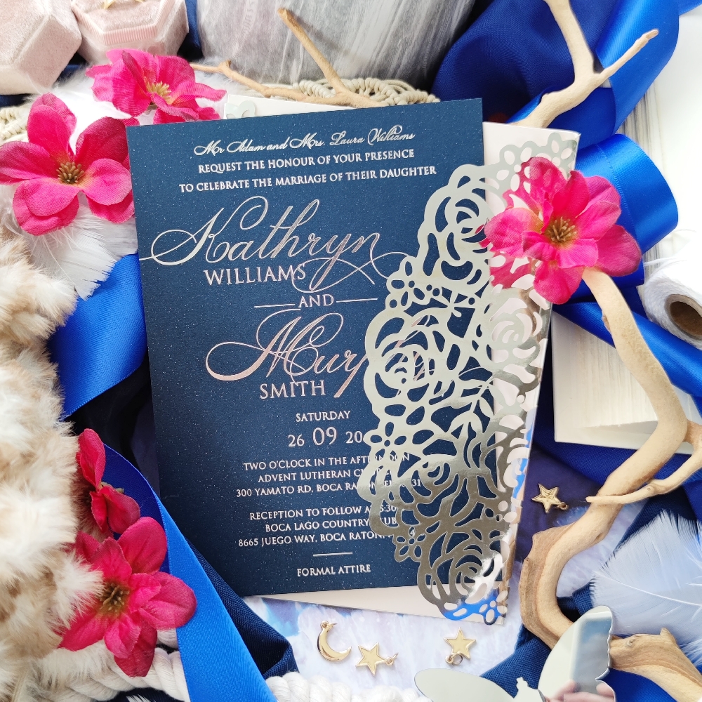 A starry night navy blue papered wedding invitation with silver foil printing.