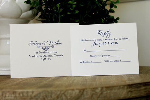 Invitation 1525: This soft layered invite uses our 5/8 and 1.5 inch ribbon as a flat band around the invite card.  The ribbon and tag are affixed to the card and do not slide off.