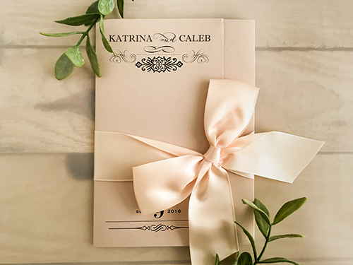 Invitation 1611: Blush Pearl, Blush Pearl, Blush Ribbon - This is a blush pearl pocket folder design that opens horizontally. There is a blush bow tied around the card. Invitation 1611: Blush Pearl, Blush Pearl, Blush Ribbon - This is a blush pearl pocket folder design that opens horizontally. There is a blush bow tied around the card.