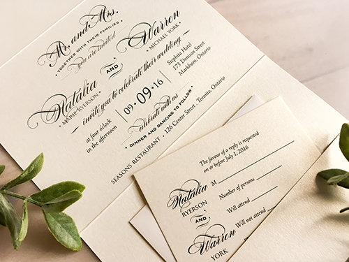 Invitation 1685: White Gold, White Gold, Deep Charcoal Ribbon, Antique Ribbon, Brooch/Buckle X - This is a full flap white gold pearl pocket folder wedding invite.  There is two ribbon stripes and brooch on the cover.