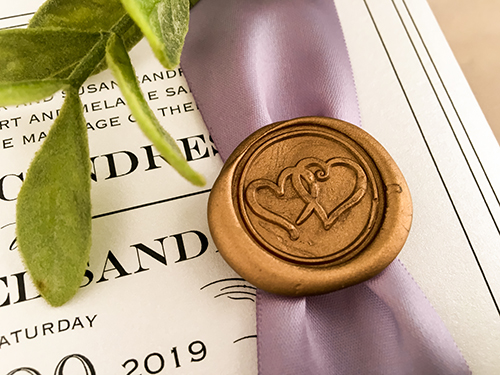 Invitation 2134: White Gold, Gold Wax, Lavender Ribbon - This is a single card landscape orientated wedding invite with a lavender ribbon and gold wax seal.