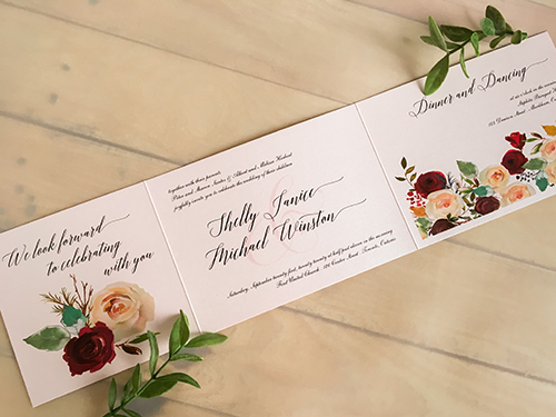 Invitation 2200: Light Pink Pearl - Trifold wedding invitation with a vellum belly band.  Floral deigns printed on the cover and inside to match.