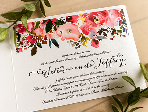 Invitation 2258: This is a bifold wedding invitation with a navy blue ribbon and wax seal on the cover and florals printed on the inside as well as the front of the invitation.