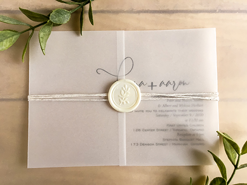 Invitation 2261: Vellum, Ivory Wax - This is a gate fold landscape design printed on vellum paper.  There is a white string wrapped around with an ivory branch wax seal.