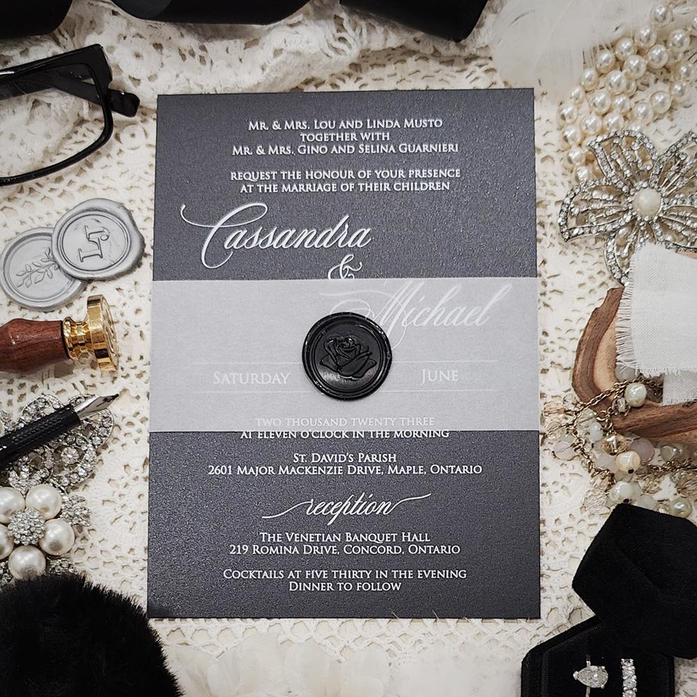 Invitation 3701: Black Pearl, Black Wax - White ink printing on black paper with a vellum belly band and black wax seal.