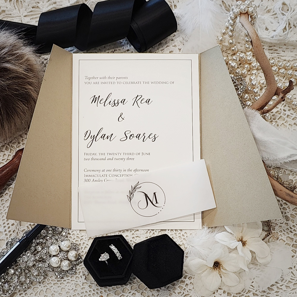 Invitation 3306: Gold Pearl, Cream Smooth - Slanted gatefold invitation in gold pearl with a printed vellum belly band.