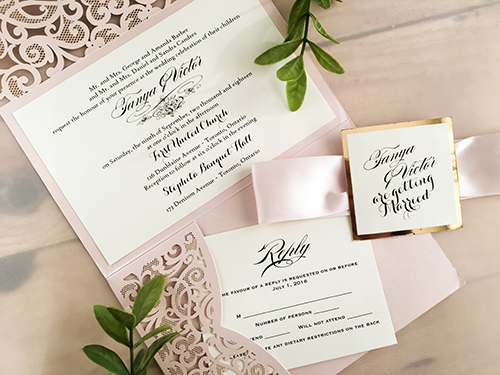 Invitation lc101: Blush Shimmer, Gold Mirror, Cream Smooth, Petal Pink Ribbon - This is a blush shimmer laser cut pocketfolder wedding invite.  There is a petal pink ribbon and gold mirror layered cover tag on the flap.