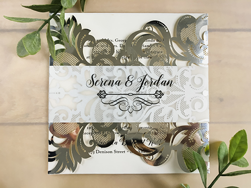 Invitation lc108: Mirror Silver, Cream Smooth - This is a silver mirror gate fold style laser cut wedding invitation.  There is also a vellum printed belly band.