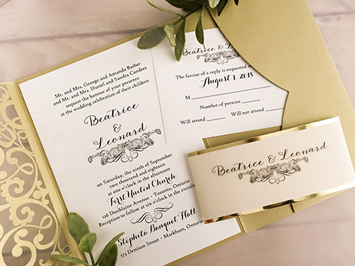 Invitation lc112: Metallic Gold, Gold Mirror, Cream Smooth - This is a metallic gold laser cut wedding invitation with a vellum belly band that has a gold mirror backing.