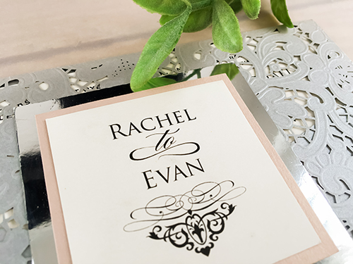 Invitation lc13: Rectangular laser cut invitations with double layered cover tag. Cover tag uses both pearl paper and mirror paper and is attached on to the lace cut out design.