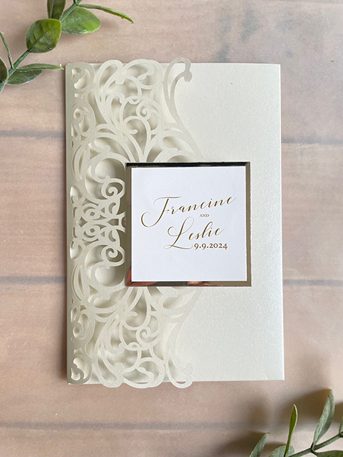 Invitation lc156: Beige Shimmer, Gold Mirror, Cream Smooth - This pocketfold lasercut is in a beige color in a rectangular shape.  The cover has the names of the bride and groom.