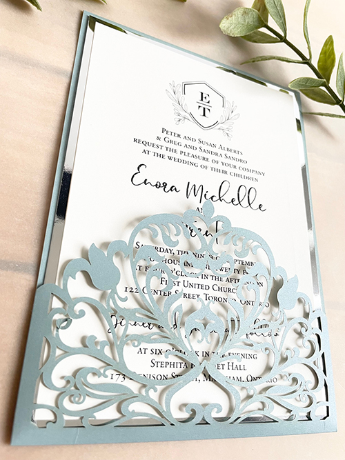 Invitation lc163: Silver Mirror - This wedding invitation design is a pocket style lasercut invite with the invitation wording card pulling out of the pocket.