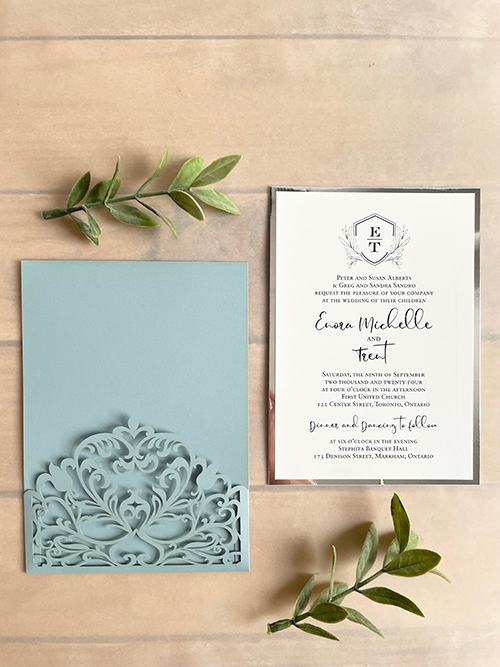 Invitation lc163: Silver Mirror - This wedding invitation design is a pocket style lasercut invite with the invitation wording card pulling out of the pocket.