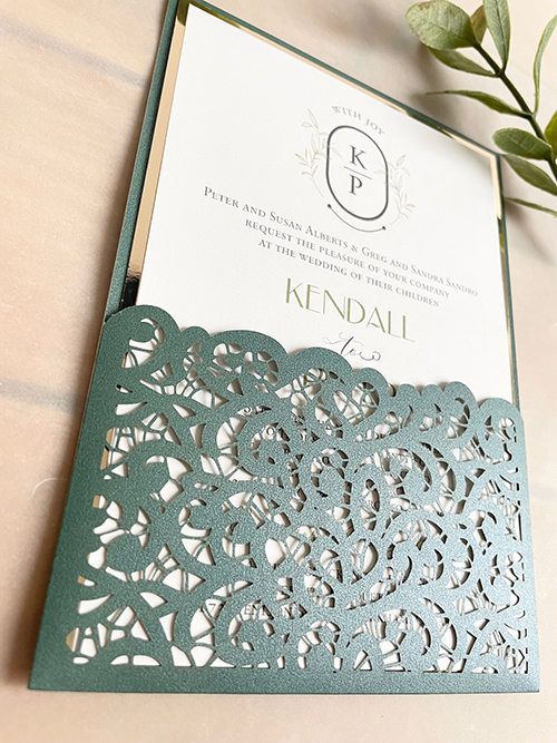 Invitation lc164: Gold Mirror - Emerald green lasercut pocket style wedding invitation with a gold chrome matting for the invitation wording card.