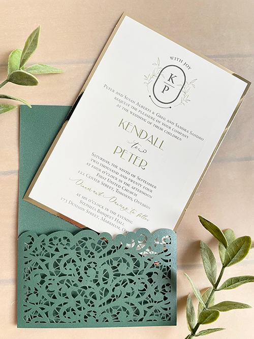 Invitation lc164: Gold Mirror - Emerald green lasercut pocket style wedding invitation with a gold chrome matting for the invitation wording card.