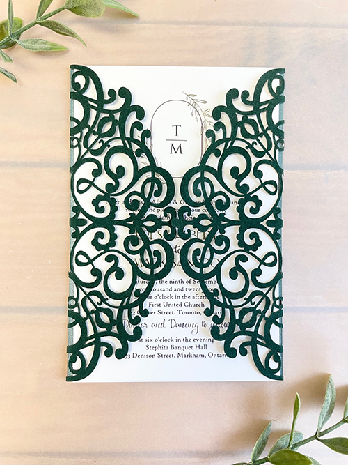 Invitation lc169: Emerald Green Velvet, Cream Smooth - This is an elegant emerald green velvet lasercut invitation.  The two lacey sides open and the invitation card is sits inside.