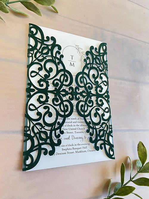 Invitation lc169: Emerald Green Velvet, Cream Smooth - This is an elegant emerald green velvet lasercut invitation.  The two lacey sides open and the invitation card is sits inside.