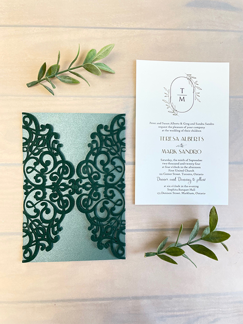 Invitation lc169: Emerald Green Velvet, Cream Smooth - This is an elegant emerald green velvet lasercut invitation.  The two lacey sides open and the invitation card is sits inside.