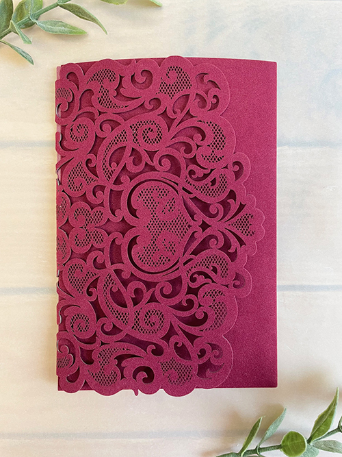 Invitation lc170: Burgundy Velvet, Cream Smooth - This burgundy velvet pocketfold invitation opens into a three fold card with a pocket on the right and the invitation wording in the center.