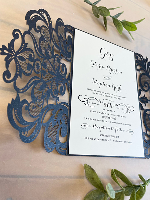 Invitation lc171: Glittering Black, Cream Smooth - This rectangular lasercut opens left and right with the main invitation card in the middle.