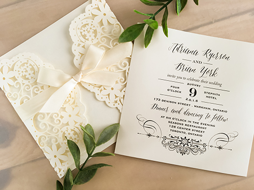 Invitation lc42: Glittering Ivory, Cream Smooth, Antique Ribbon - This is a glittering ivory laser cut wedding card that has a gate fold design.  There is a 5/8 antique bow tied around the card.