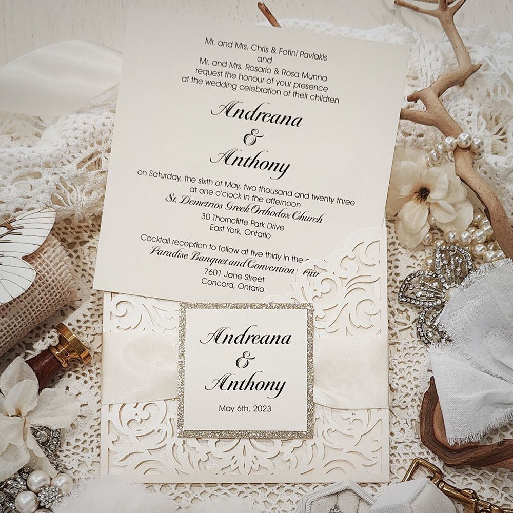 Invitation 8026: Ivory Shimmer, Champagne Glitter, Cream Smooth, Antique Ribbon - single panel pocket lasercut with ribbon and layered tag