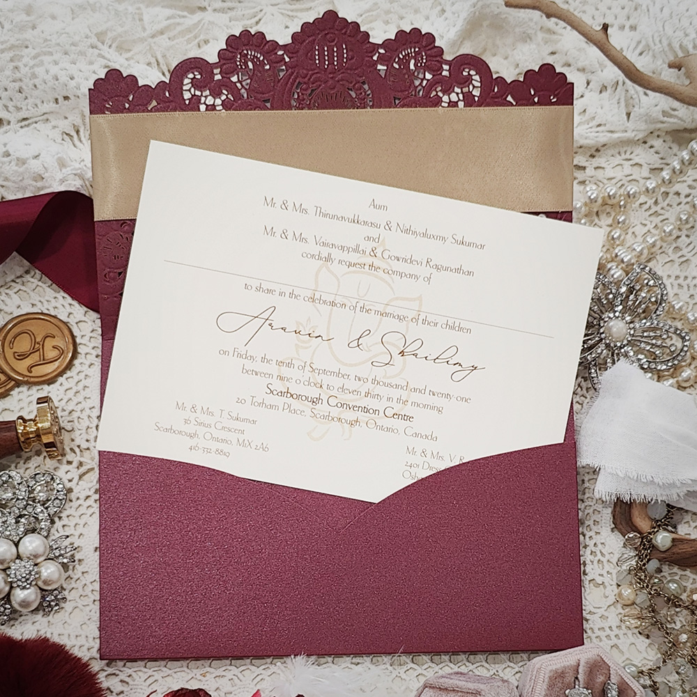Invitation 8102: Burgundy Shimmer, Gold Mirror, Cream Smooth, Champagne Ribbon - Burgundy Ganesh bifold pocket lasercut with ribbon and layered tag