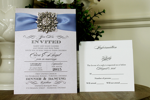 Invitation 1305: Orchid Pearl, Periwinkle Ribbon, Brooch/Buckle A11, Metal Filigree F5 - Silver - Orchid pearl paper with a periwinkle ribbon and brooch design