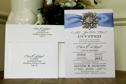 Invitation 1305: Orchid Pearl, Periwinkle Ribbon, Brooch/Buckle A11, Metal Filigree F5 - Silver - Orchid pearl paper with a periwinkle ribbon and brooch design