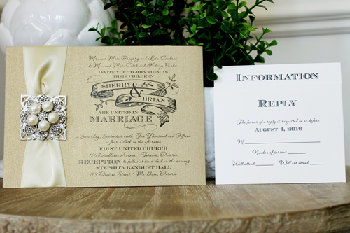 Invitation 1311: Gold Pearl, Buttermilk Ribbon, Brooch/Buckle T, Metal Filigree F5 - Silver - Gold Pearl paper with a buttermilk satin ribbon and pearl brooch