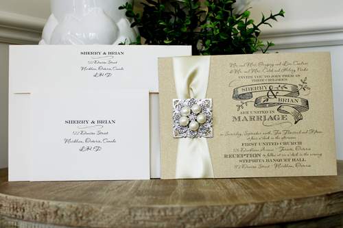 Invitation 1311: Gold Pearl, Buttermilk Ribbon, Brooch/Buckle T, Metal Filigree F5 - Silver - Gold Pearl paper with a buttermilk satin ribbon and pearl brooch