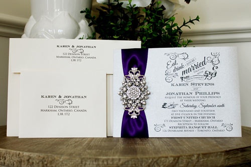 Invitation 1329: Silver Ore, Purple Ribbon, Brooch/Buckle A11, Metal Filigree F4 - Silver - Silver ore paper invite with a purple ribbon and flower brooch