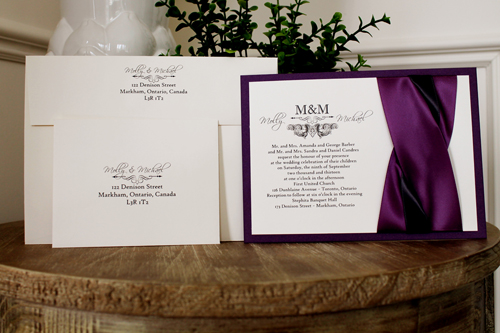 Invitation 1104: Purple Pearl, Cream Smooth, Grape Ribbon, Grape Ribbon, Deep Charcoal Ribbon - Purple pearl layered invite with a grape and charcoal ribbon twist